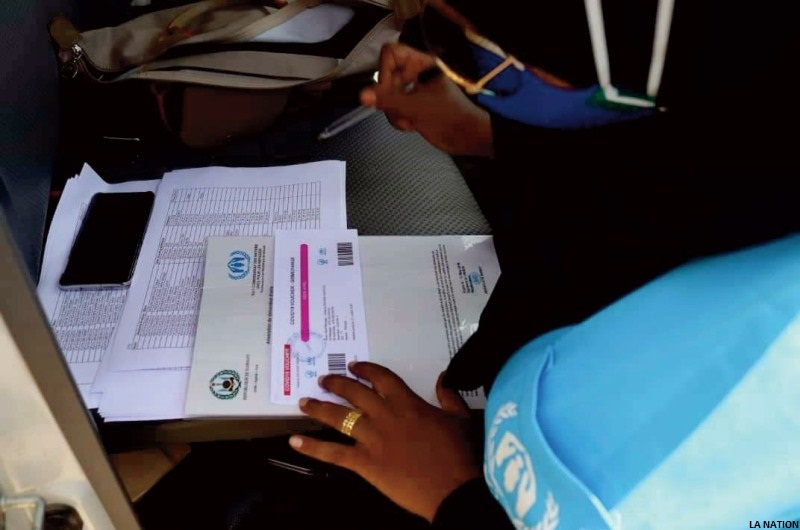 Distribution de coupons alimentaires aux réfugiés dans la capitale